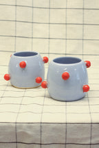 Dwie okrągłe czarki w kulki circus