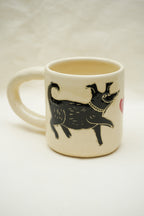 Pies kundelek na kubku