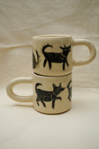 Kubki w czarne kundelki